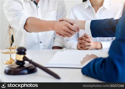 lawyer consultant negotiating a contract hand shaking deal