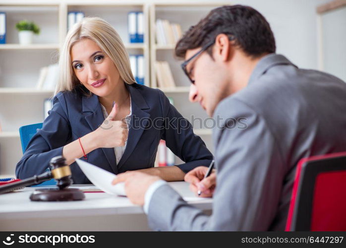 Lawyer discussing legal case with client