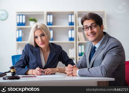 Lawyer discussing legal case with client