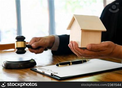 Lawyer Legal counsel presents to bid sale judgment mallet with judgeReal estate auction bid property sale judgment with Gavel