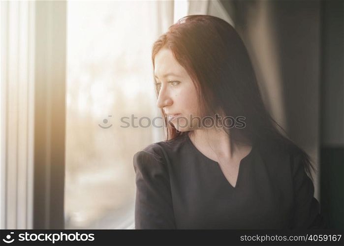 lawyer looking through window