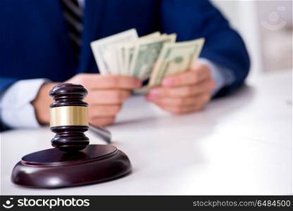 Lawyer receiving money as bribe