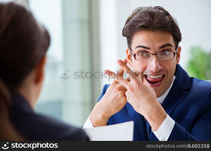 Lawyer talking to his client in office