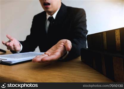 Lawyer working with contract client on the table in office. consultant lawyer, attorney, court judge, concept.