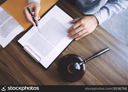 lawyer working with documents at a courtroom