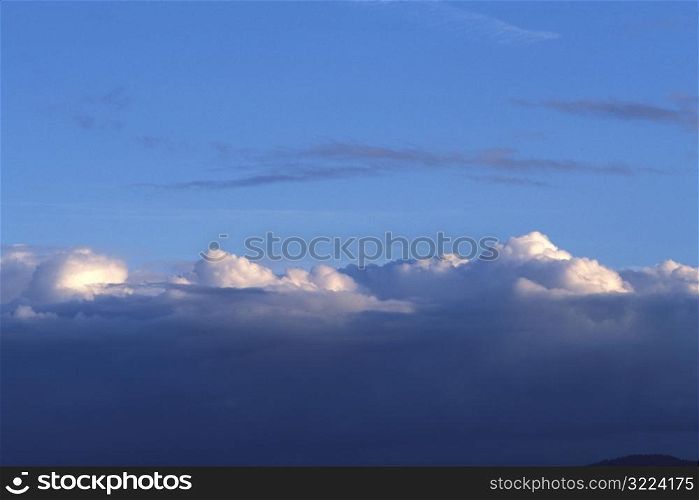 Layers Of Clouds In A Blue Sky