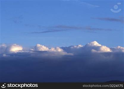 Layers Of Clouds In A Blue Sky