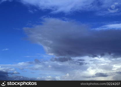 Layers Of Clouds In A Blue Sky