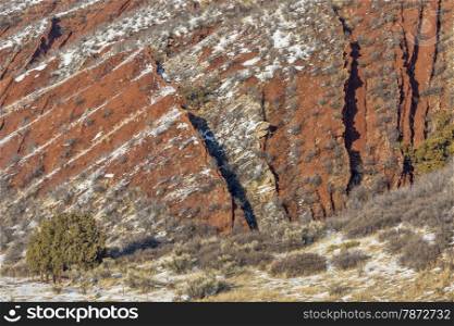 layers of red sandstone rock - winter scenery in Red Mountain Open Space near Fort Collins, Colorado