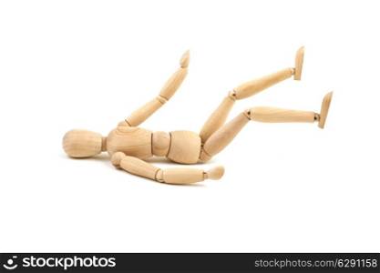 Laying wooden dummy isolated on a white background