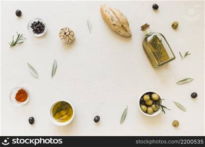 layout oil bottle bread olives spices