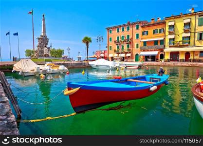 Lazise turquoise harbor and Lago di Garda view, Veneto region of Italy