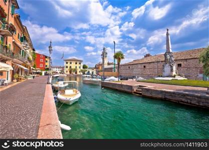 Lazise turquoise harbor and waterfront view, Lago di Garda, Veneto region of northern Italy