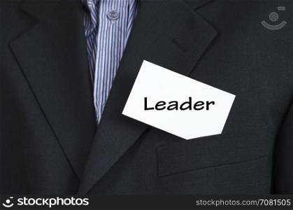 Leader text note concept over business man background
