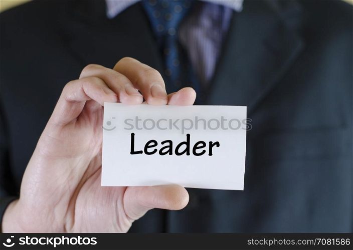 Leader text note concept over business man background