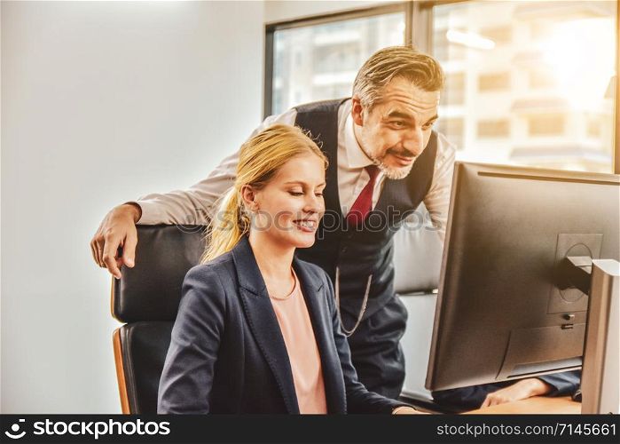 Leader training Operator to business plan marketing concept and use computer for work in office
