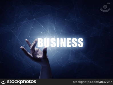 Leadership and success motivation. Success message in businessman hand on dark digital background