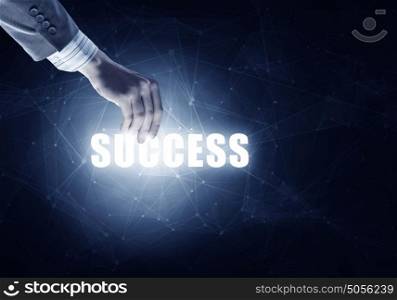 Leadership and success motivation. Success message in businessman hand on dark digital background