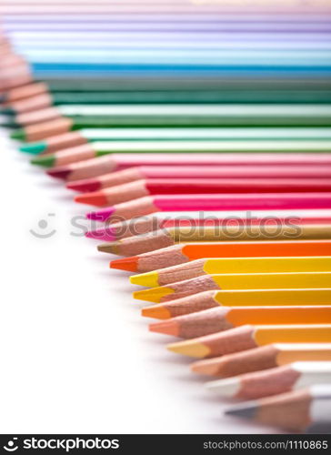 leadership concept with one pencil standing out of crowd of other pencils