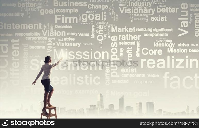Leadership ideas and mission. Businesswoman standing on chair and reaching leadership concepts