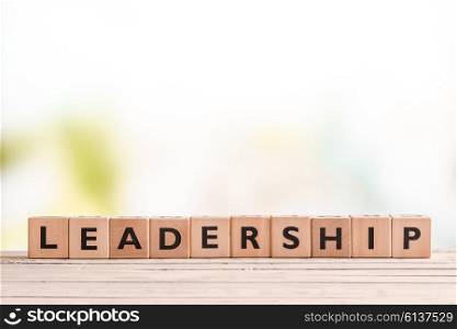 Leadership sign made of blocks on a wooden desk