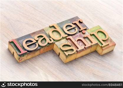 leadership word abstract in letterpress wood printing blocks stained by color inks