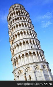 Leaning Tower of Pisa against blue sky, Italy