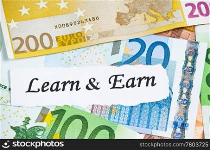 Learn and earn concept with euro notes