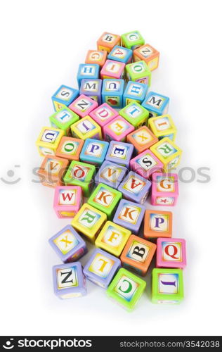 Learning and education concept - pile of alphabet blocks