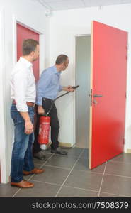 learning to use a fire extinguisher