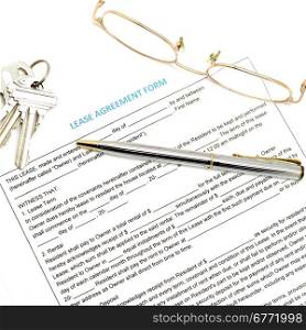 lease agreement document with key and pen