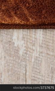 Leather belt over wooden background.