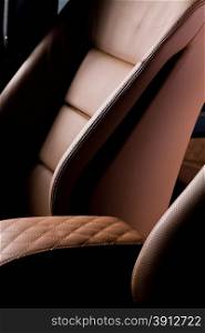 Leather car seat close up photo