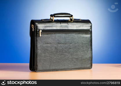 Leather case on the table against background