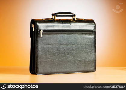 Leather case on the table against background