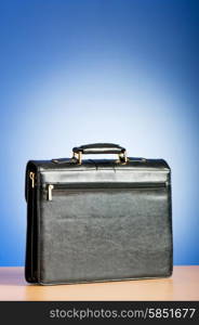 Leather case on the table against background