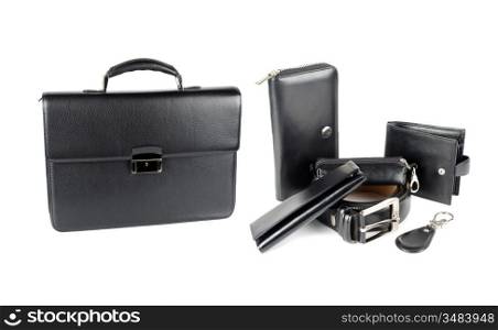 Leather male bag with accessories on a white