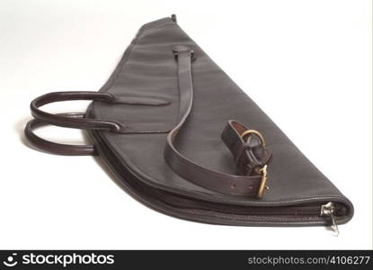 Leather rifle slip with room for a sight and scope