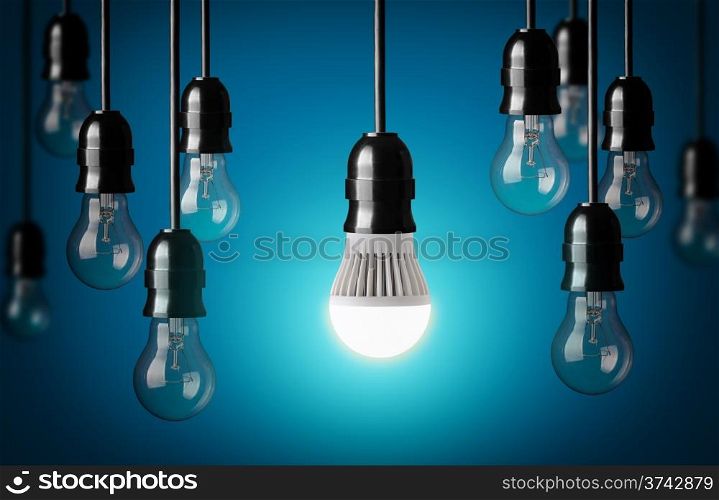 LED bulb and simple light bulbs.Blue background