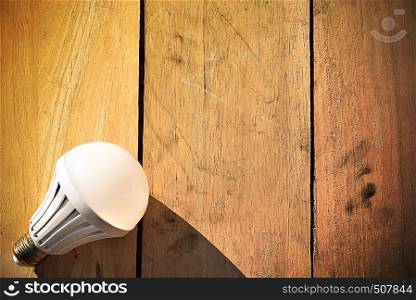 Led lamp on wooden floor