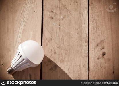 Led lamp on wooden floor