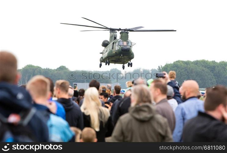 LEEUWARDEN, NETHERLANDS - JUNE 11 2016: Chinook CH-47 military helicopter in action during a demonstration flight on june 11 , 2016 in Leeuwarden