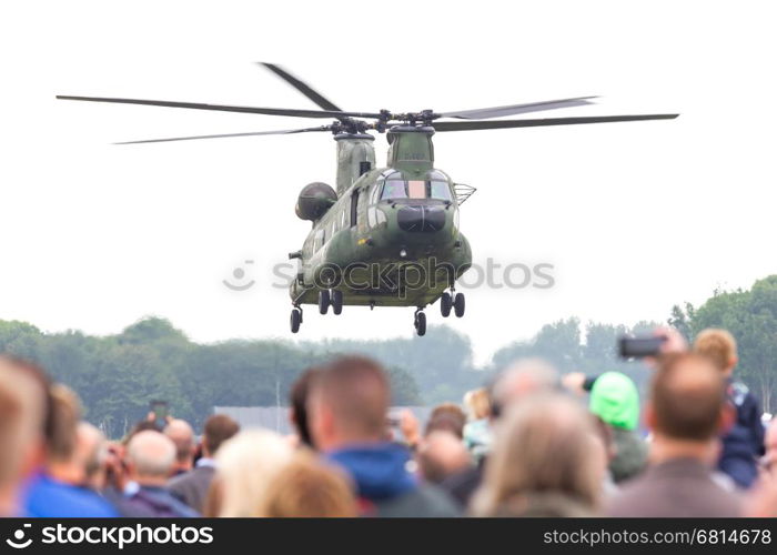 LEEUWARDEN, NETHERLANDS - JUNE 11 2016: Chinook CH-47 military helicopter in action during a demonstration flight on june 11, 2016 in Leeuwarden