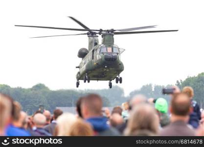 LEEUWARDEN, NETHERLANDS - JUNE 11 2016: Chinook CH-47 military helicopter in action during a demonstration flight on june 11, 2016 in Leeuwarden