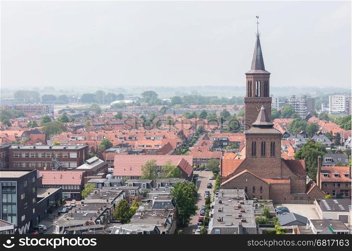 LEEUWARDEN, NETHERLANDS - MAY 28, 2016: View of a part of Leeuwarden with a big church on may 28, 2016.