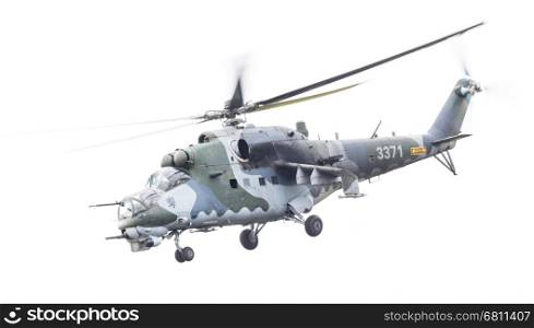 LEEUWARDEN, THE NETHERLANDS - JUN 10, 2016: Czech Republic Air Force Mil Mi-24 Hind attack helicopter performing a demonstration during the Royal Netherlands Air Force Days