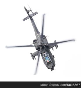 LEEUWARDEN, THE NETHERLANDS - JUN 11, 2016: Boeing AH-64 Apache attack helicopter flying a demo during the Royal Netherlands Air Force Days