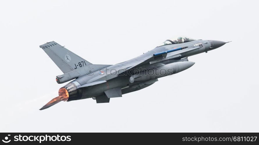 LEEUWARDEN, THE NETHERLANDS - JUN 11, 2016: Dutch F-16 fighter jet take off during the Royal Netherlands Air Force Days