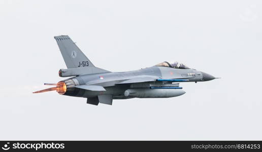 LEEUWARDEN, THE NETHERLANDS - JUN 11, 2016: Dutch F-16 fighter jet take off during the Royal Netherlands Air Force Days