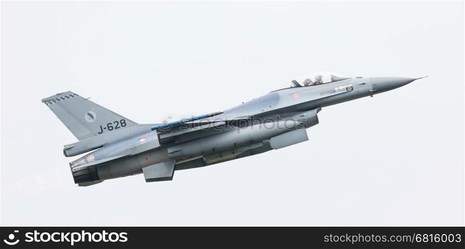 LEEUWARDEN, THE NETHERLANDS - JUN 11, 2016: Dutch F-16 fighter jet take off during the Royal Netherlands Air Force Days